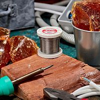 Припой с канифолью ПОС-61, 100г, 2мм, (олово 61%, свинец 39%), катушка | код 09-3173 | REXANT